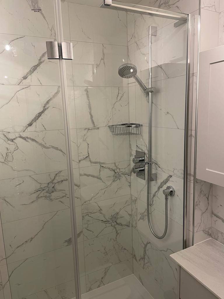 Shower Enclosure with Marble effect tiling - Surbiton